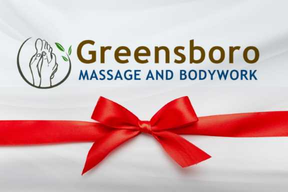 Image of Greensboro Massage and Bodywork Gift Card, with white background, Greensboro Massage and Bodywork Logo at the top, and a big red bow in the middle.